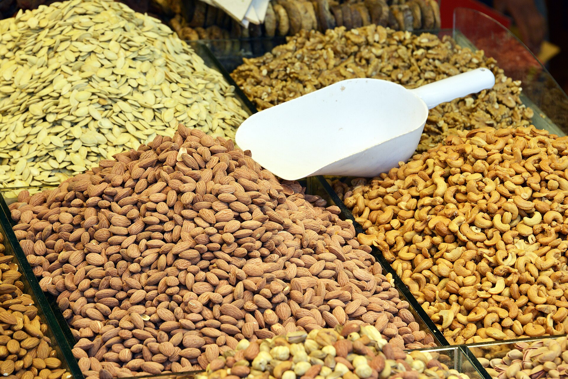 Various nuts on Egyptian Market (Spice Bazaar) in Istanbul - almonds, pumpkin seeds, cashew nuts, nuts, pistachios, chickpea ...