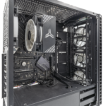 Image of a gaming PC with hardware from the late 2010s or early 2020s. This includes Kolink Observatory RGB Midi-Tower with Tempered Glass, ASUS ROG STRIX Z390-F Gaming, Intel Core i9-9900K, Jonsbo CPU cooler, Kolink Continuum 1200W. Here 2 SSDs (1x NVMe SSD, 1x SATA SSD) and graphics card (GeForce RTX 3090) are missing.