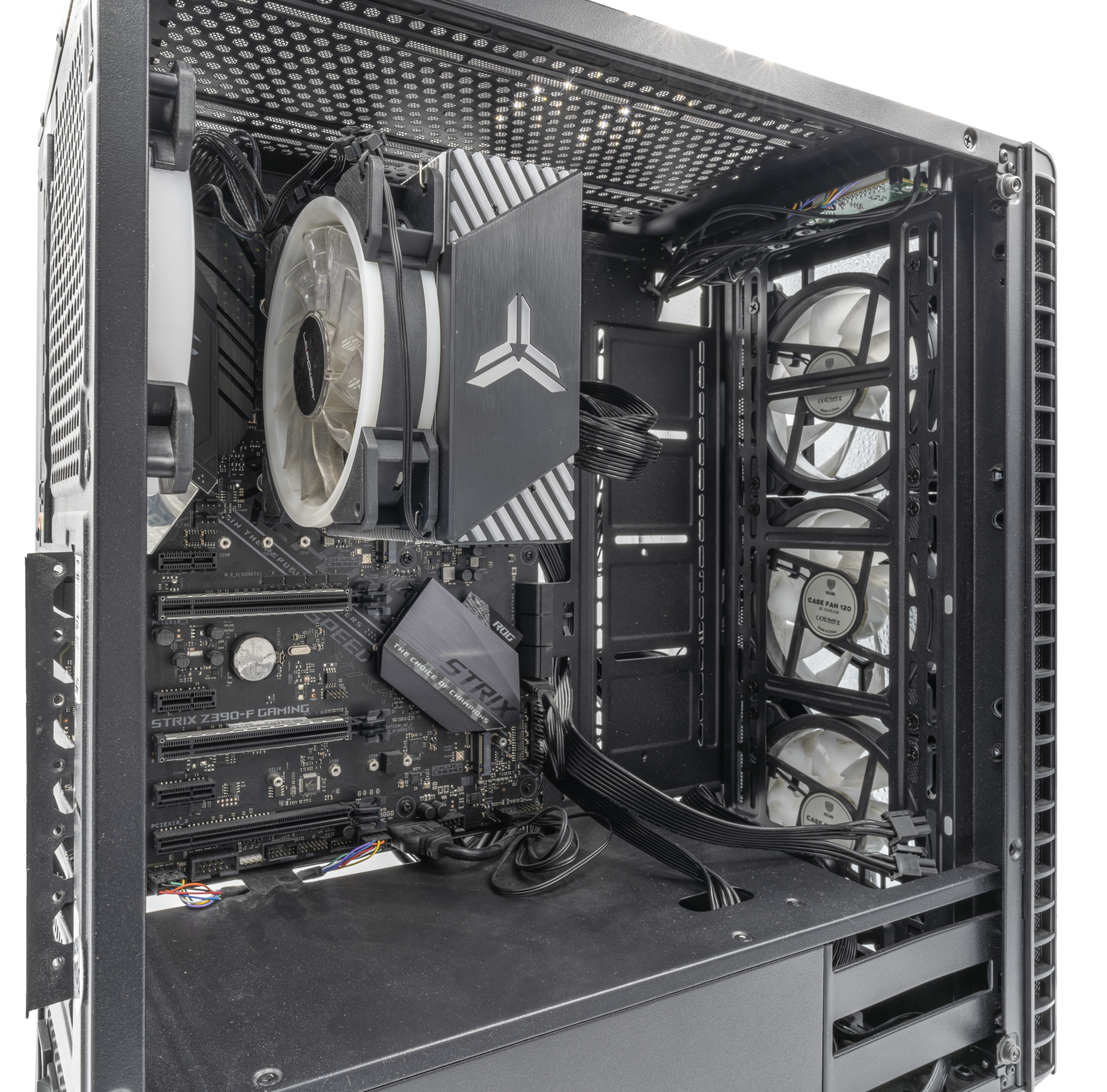 Image of a gaming PC with hardware from the late 2010s or early 2020s. This includes Kolink Observatory RGB Midi-Tower with Tempered Glass, ASUS ROG STRIX Z390-F Gaming, Intel Core i9-9900K, Jonsbo CPU cooler, Kolink Continuum 1200W. Here 2 SSDs (1x NVMe SSD, 1x SATA SSD) and graphics card (GeForce RTX 3090) are missing.